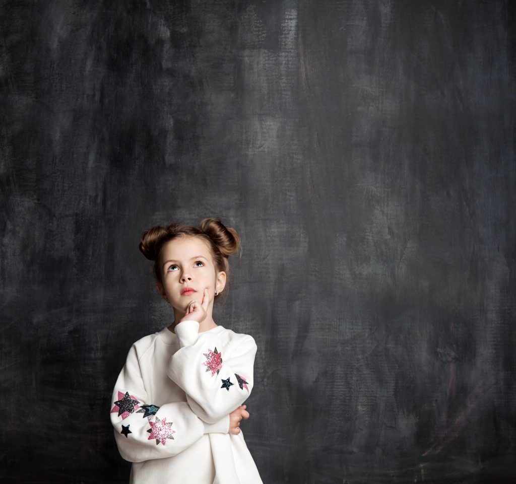 Girl thinking about a problem solving strategy