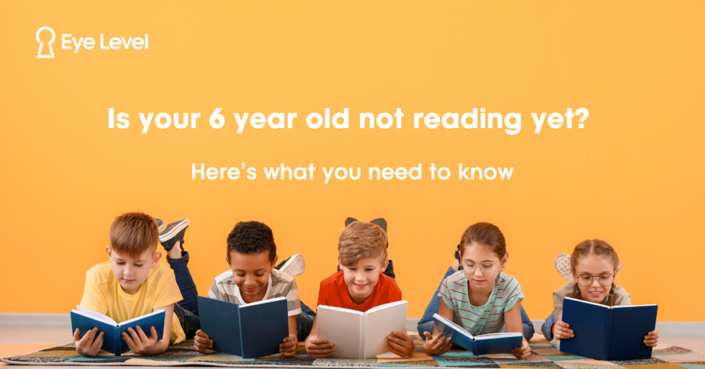 5 children laying on their stomachs reading a book each